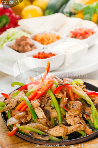 Image of original fajita sizzling hot  on iron plate