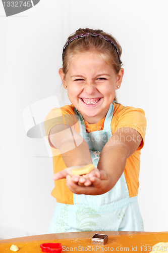 Image of Child baking cookies