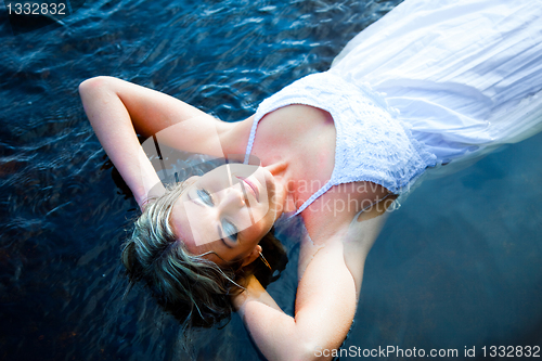 Image of beautiful woman enjoying silence and solitude