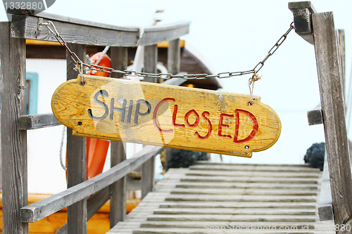 Image of Old wood notice board/Ship closed