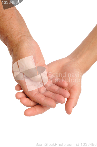 Image of  Hands of young and senior women - helping hand concept - clipping path included