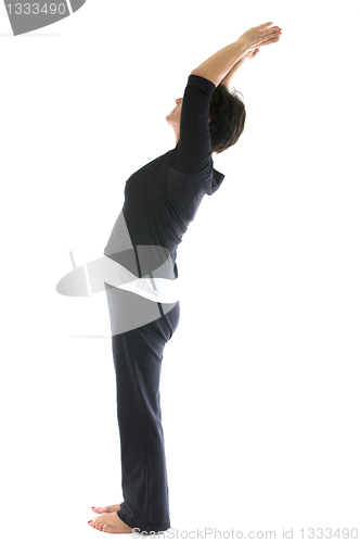 Image of middle age senior woman mountain tadasana yoga back stretch posi