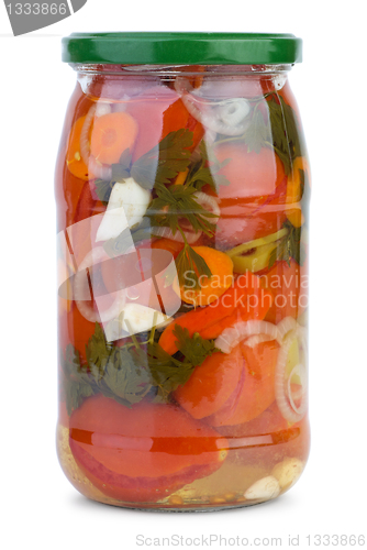 Image of Glass jar with marinated tomatoes and vegetables