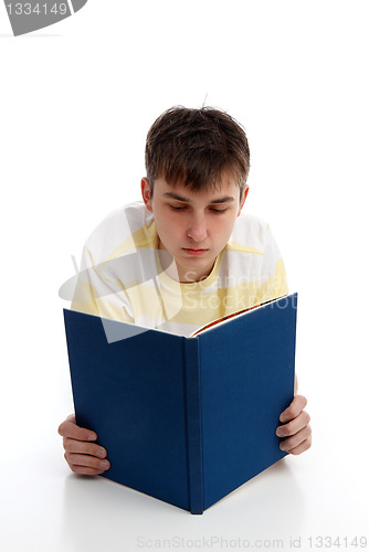 Image of Boy reading learning studying