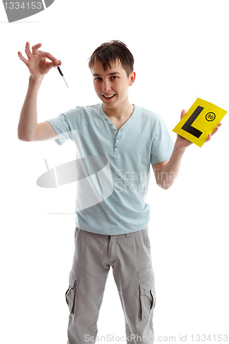 Image of Teenager holding car keys and L plates