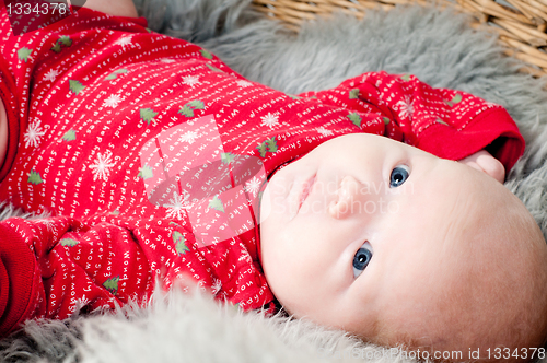 Image of Little cute baby in red