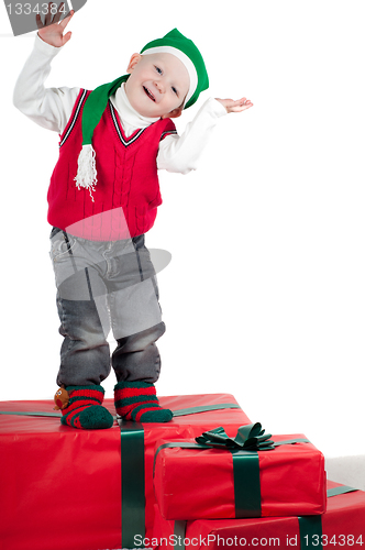 Image of Christmas toddler with presents