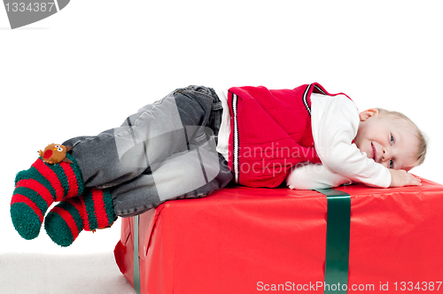 Image of Christmas toddler with presents