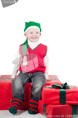 Image of Christmas toddler with presents
