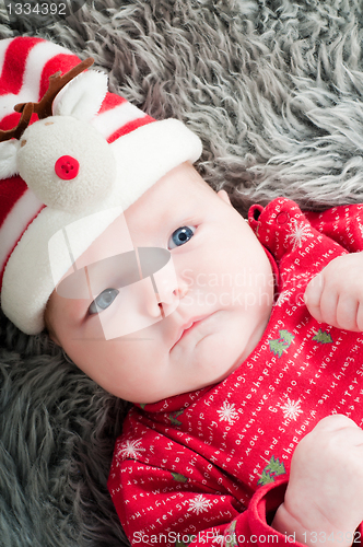 Image of Little cute baby in red
