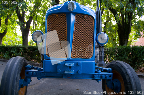 Image of Old model of tractor, renovated to be in superb condition