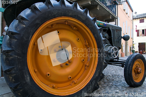 Image of Old model of tractor, renovated to be in superb condition