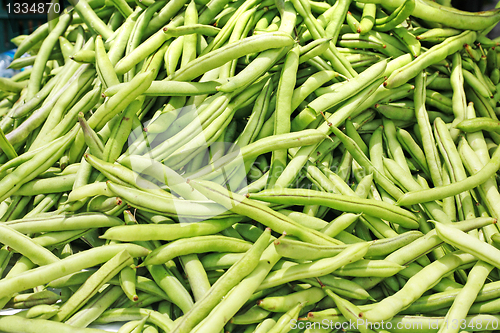 Image of Many green beans (Phaseolus vulgaris L.) on a pile