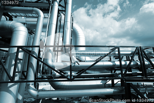 Image of Industrial zone, Steel pipelines in blue tones  