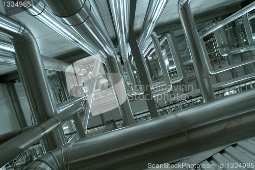 Image of Industrial zone, Steel pipelines in blue tones  