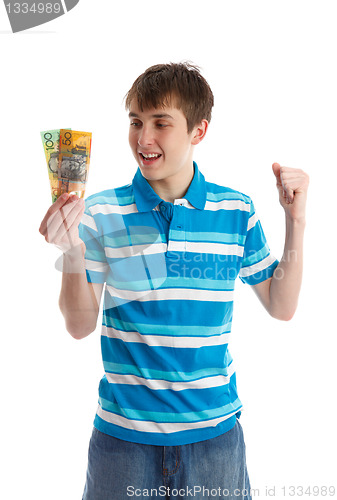 Image of Teenage boy holding money