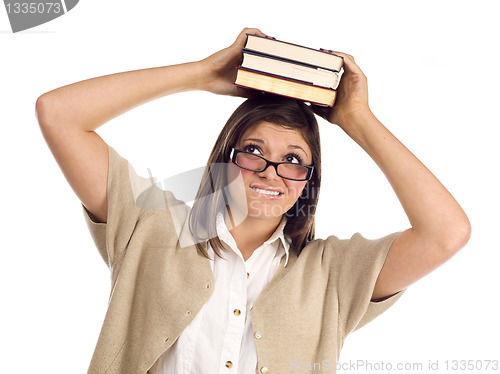 Image of Ethnic Student with Books on Her Head Over White