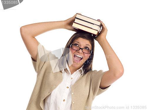 Image of Ethnic Student with Books on Her Head Over White