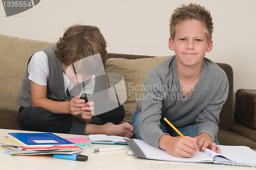 Image of Doing homework while gaming