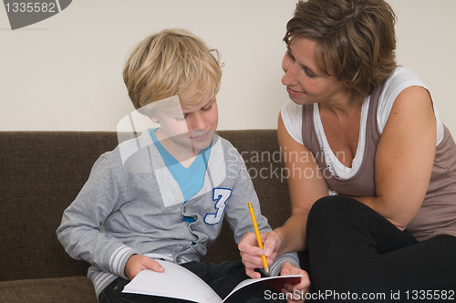 Image of Doing homework with mother