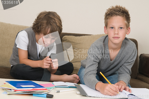 Image of Doing homework while gaming