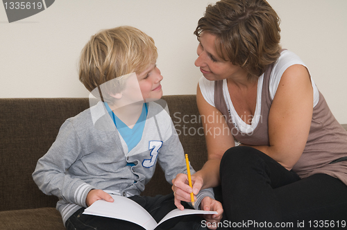 Image of Doing homework with mother