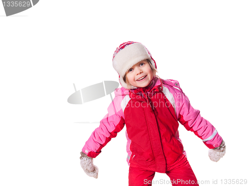 Image of laughing girl wearing mittens with snow