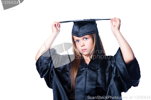 Image of cute girl in black academic capand gown