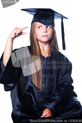 Image of cute girl in black academic capand gown