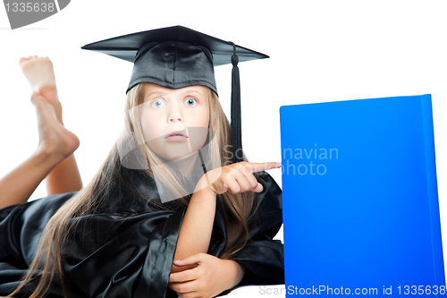 Image of cute girl in black academic capand gown