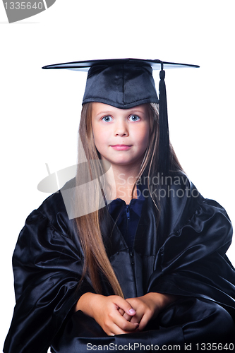 Image of cute girl in black academic capand gown