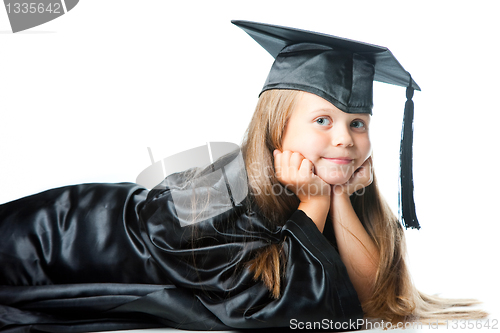 Image of girl in black academic capand gown