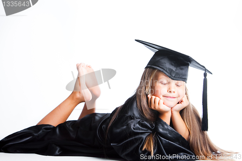 Image of girl in black academic capand gown