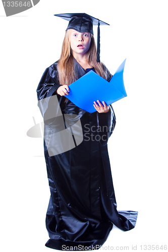 Image of girl in black academic cap and gown