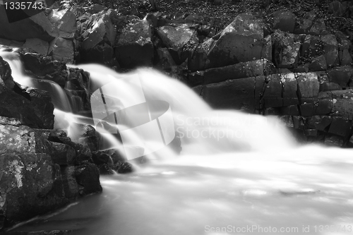 Image of Beautiful and peaceful waterfall in the nature