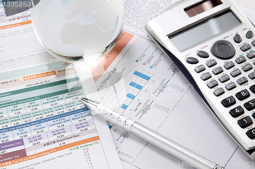 Image of financial charts and graphs on the table 