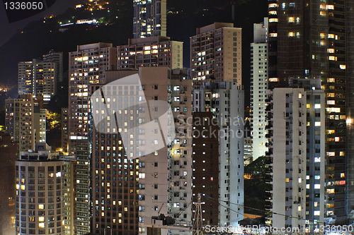 Image of apartment building at night