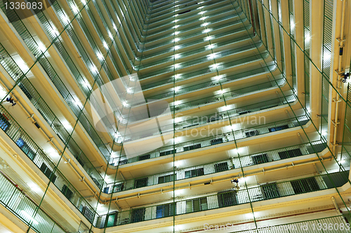 Image of apartment building at night