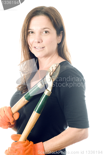 Image of middle age  woman gardener with lopper tree cutting tool