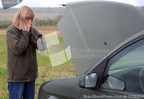 Image of Woman and Her Broken Car