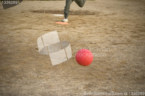 Image of red kickball approach