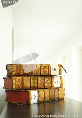 Image of old books in library