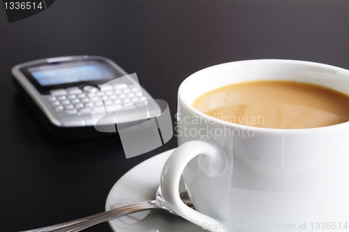 Image of cup of coffee in the office