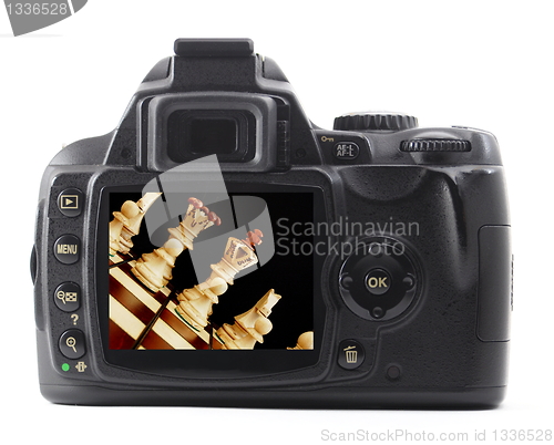 Image of digital camera and chess