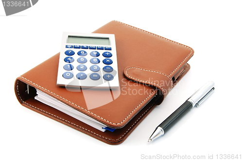 Image of business organizer and pen