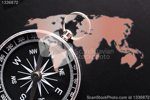 Image of compass and world map