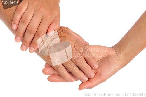 Image of Hands of young and senior women - helping hand concept - clipping path included