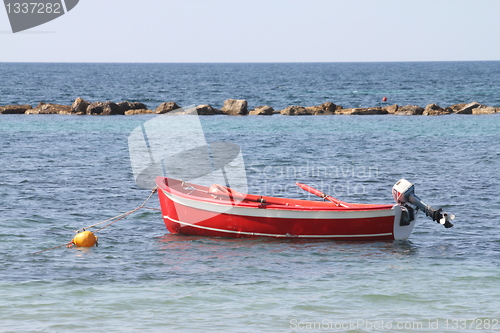 Image of small rowing boat on the water