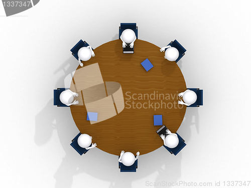 Image of Above view of business team discussing at meeting 