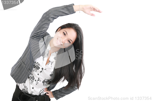 Image of business woman portrait stretching isolated over a white backgro